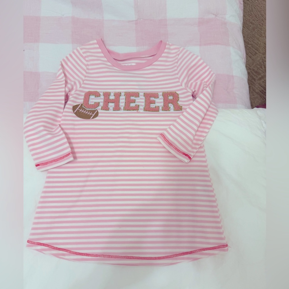 NWT. Cheer dress. 12-18M. Mudpie.